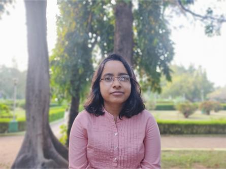 A photo of Nabanita Samanta with a background of trees