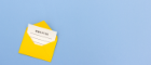 Yellow envelope with newsletter on blue background
