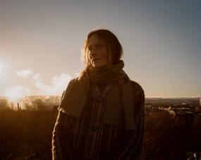 Sarah Bernstein outside on a bright winter's day